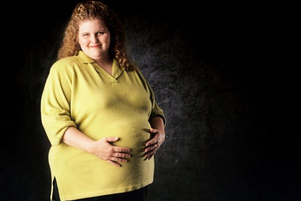 беременная с весом